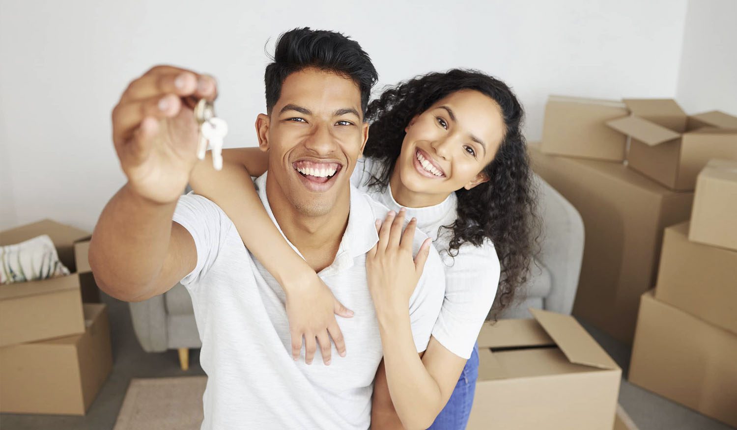 happy couple with keys sized copy Buyer's Resources